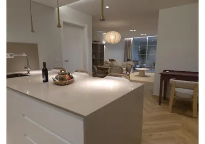 a kitchen with a counter with a bowl of fruit on it at Shell Living - Marina in Funchal