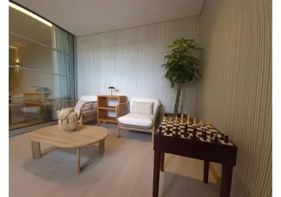 a living room with a chess board on a table at Shell Living - Marina in Funchal