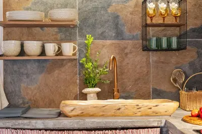 a wooden sink with a faucet on a counter at Apple Tree House in Santa Cruz