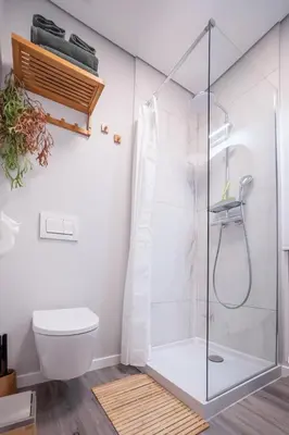 a bathroom with a shower and a toilet at Old Town Charm Apartment Funchal in Funchal