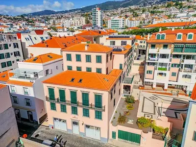 an aerial view of a city with orange roofs at Old Town Charm Apartment Funchal in Funchal