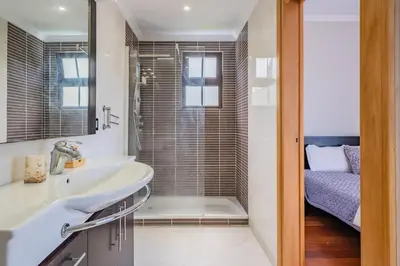 a bathroom with a sink and a shower at Country Escape in Ribeira Brava