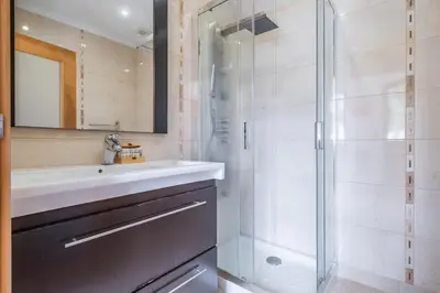 a bathroom with a sink and a shower at Country Escape in Ribeira Brava