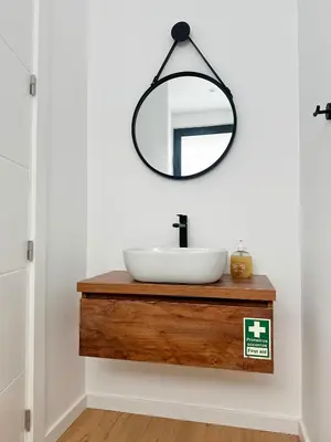 a bathroom with a sink and a mirror at Casa do Faial By Madeira Atlantic Escape in Funchal
