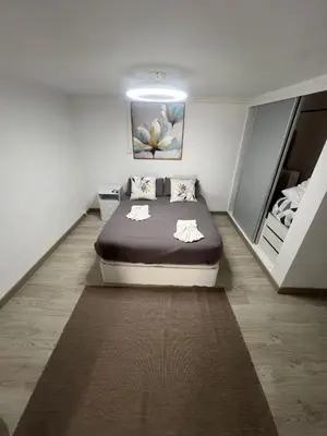 a bathroom with a shower and a toilet and a sink at Serenity Apartment in Funchal