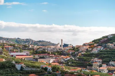 a view of a town on a hill at GuestReady - Seaview Escape in Câmara de Lobos