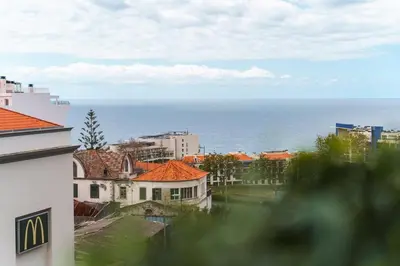 a view of the ocean from a building at GuestReady - Peaceful haven in Funchal in Funchal
