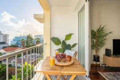 a tray of fruit on a table on a balcony at Conde Casa Branca by LovelyStay in Funchal