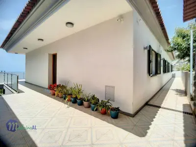 a balcony with potted plants on the side of a building at Holiday Home Yohannas Unterkunft by Interhome in Campanário