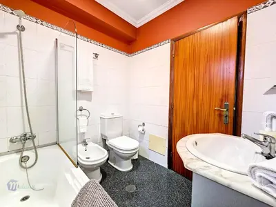 a bathroom with a toilet and a sink at Apartment Domus Dino by Interhome in Porto da Cruz
