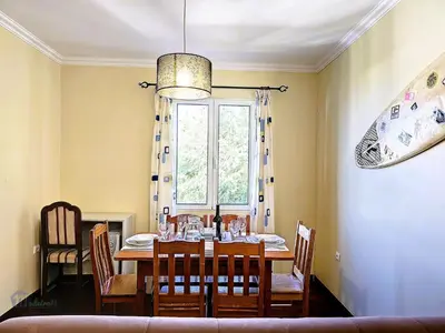 a dining room with a table and a window at Apartment Domus Dino by Interhome in Porto da Cruz