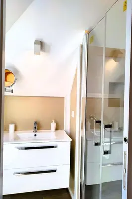 a bathroom with a sink and a shower at Holiday Home Urlaubshaus Vier Generationen by Interhome in Seixal