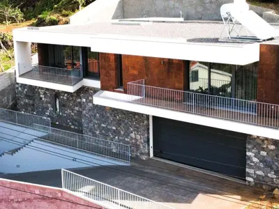 a building with balconies on the side of it at Holiday Home Traumhaus 2- von LSAMadeira by Interhome in Calheta