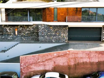 two parking meters in front of a building at Holiday Home Traumhaus 2- von LSAMadeira by Interhome in Calheta