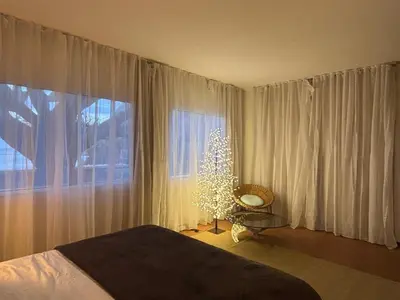 a view of the ocean at night at Suite Vigia Jardim in Jardim do Mar