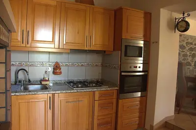 a room with a sink in the corner of a room at Casa Tabua in Ribeira Brava