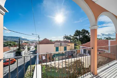 a balcony with a view of a street at Casa NOLA by Susys Holidays in Funchal
