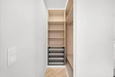 an open door to a closet with shelves at Casa NOLA by Susys Holidays in Funchal