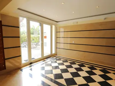 a room with a checkered floor and a large window at Apartment Funchal Wohnung mit Pool by Interhome in Funchal