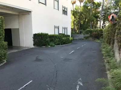 an empty parking lot in front of a building at Apartment Funchal Wohnung mit Pool by Interhome in Funchal