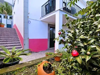 a house with plants in front of a building at Holiday Home Haus Seixal by Interhome in Seixal
