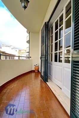 a balcony of a house with a large door at Apartment Wohnung in Funchal- in der Nähe von Farmers Market by Interhome in Funchal