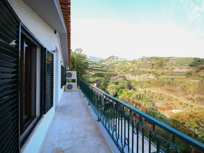 a balcony with a view of a valley at Holiday Home Villa Lapa in Câmara de Lobos by Interhome in Câmara de Lobos