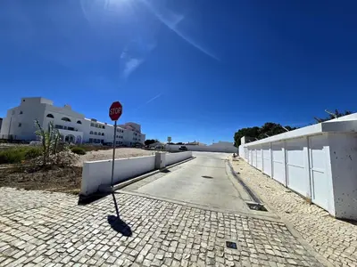 a stop sign sitting on the side of a street at Sagres Escape Near Mareta Beach in Sagres