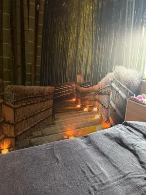 a bedroom with a bed and some stairs with lights at NEW Salema Seaview in Salema