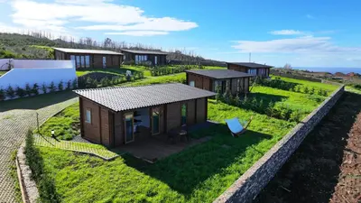 an overhead view of a tiny house in a field at Sunset Eco Shelter 2 in Ponta do Pargo