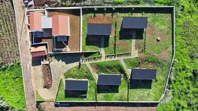 an aerial view of a yard with solar panels at Sunset Eco Shelter 2 in Ponta do Pargo