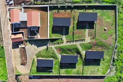 an overhead view of a yard with solar panels at Sunset Eco Shelter 4 in Ponta do Pargo