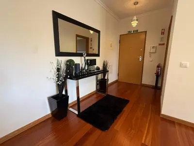 a kitchen with a sink and a stove at Madeira Sun Loft in Funchal in Funchal