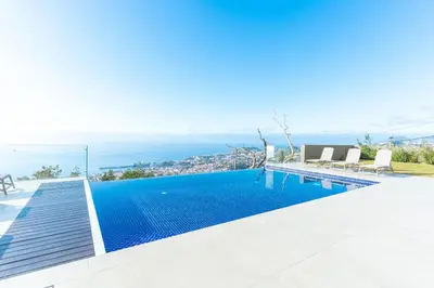 a swimming pool in a villa with a view at Eco Monte by Atlantic Holiday in Funchal