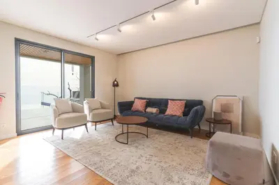 a living room with a couch and two chairs at Eco Monte by Atlantic Holiday in Funchal