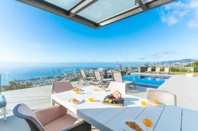 a villa with a view of the ocean at Eco Monte by Atlantic Holiday in Funchal