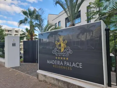 a sign for a marina palace residence at Madeira Palace Ocean View in Funchal
