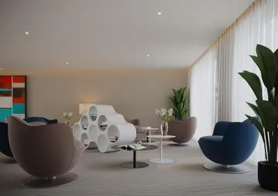 a living room with chairs and a table at Madeira Palace Ocean View in Funchal