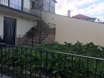 a stairwell of a house with a fence at Vivenda Silva in Seixal