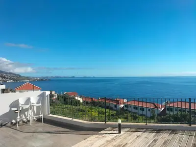 a balcony with a view of the ocean at Villa Atlantic Lodjadis in Gaula