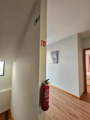 a fire hydrant on a wall in a room at Villa Barros in Câmara de Lobos