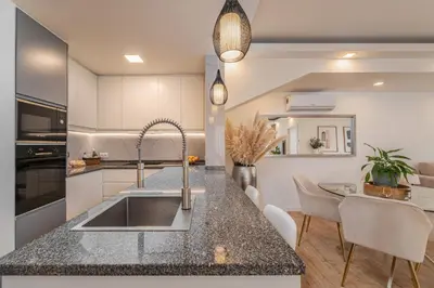 a kitchen with a sink and a counter top at The Viewpoint by Eurostay in Ribeira Brava