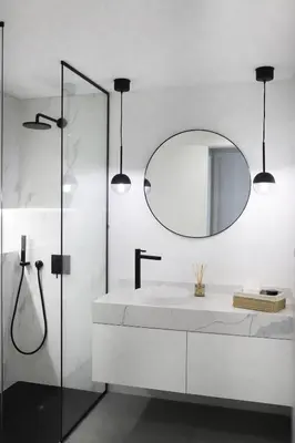 a bathroom with a sink and a mirror at B View Madeira - Ocean & Bay View Apartment in Câmara de Lobos