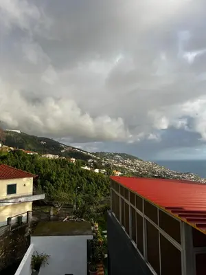 a view from a building with a red roof at Casa de férias Funchal in Nossa Senhora do Monte
