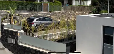 a car parked on the side of a building at BHF Residences Luxe Sunset in Arco da Calheta