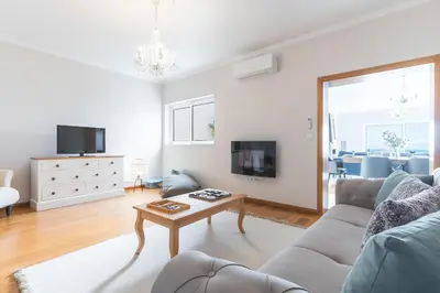 a living room with a couch and a table at Villa Valentina by Atlantic Holiday in Ponta do Sol