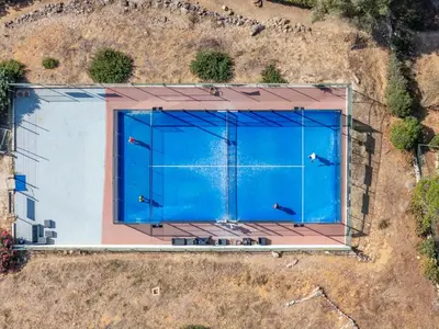 an overhead view of a large swimming pool at Tenório Beach Apartment in Lagos