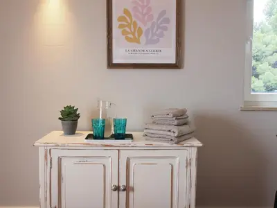 a white cabinet with towels on it in a bathroom at Breathtaking ocean views in Praia da Luz #1992 in Luz