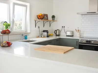 a kitchen with a wooden cutting board on a counter at Breathtaking ocean views in Praia da Luz #1992 in Luz