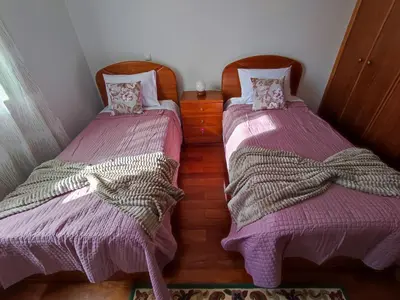 two beds sitting next to each other in a room at Madeira V2 Porto da Cruz in Porto da Cruz